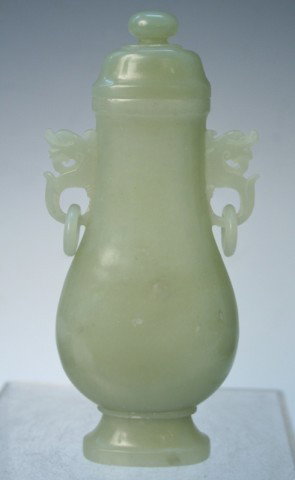 Chinese Carved Jade Covered Urn Vase: Carved jade covered urn with two dragon head handles and two loose rings, China; unmarked. Dimensions: 6-1/4"L x 3"W x 1"D