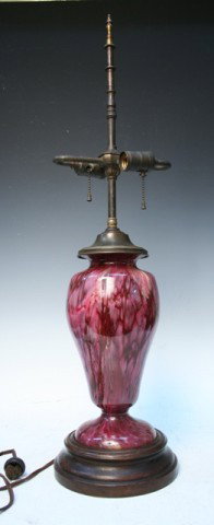 Pink Deco Schneider Glass Table Lamp ca. 1940: Art Deco table lamp with pink, dark red, and yellow mottled color, by Charles Schneider, glass and bronze with wood base, France, circa 1940; etched signature on foot of glass. Dimensions: Approximate