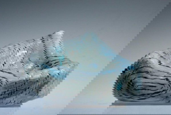 Italian Pottery Painted Bowl San Polo, Venice: Irregularly-shaped bowl featuring striped black lines forming concentric swirls on two sides set on a light-blue/white/gray/aquamarine ground, pottery, San Polo, Venice, Italy; marked on bottom. Dimen