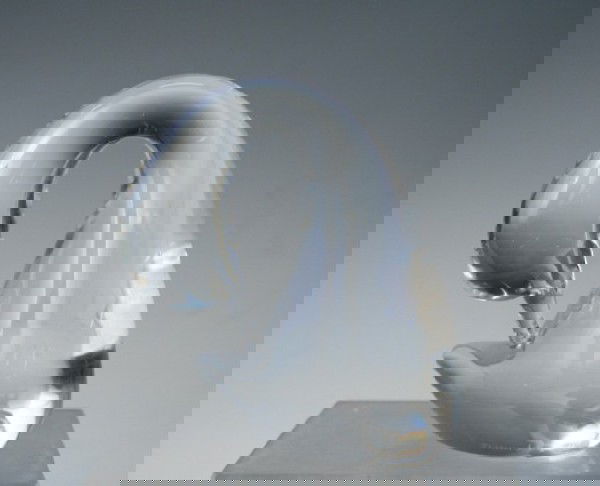 Daum France Crystal Sculpture of a Preening Goose: Handmade sculpture of a preening goose by Daum, crystal, France; etched signature along bottom edge."Daum is a crystal studio based in Nancy, France, founded in 1878 by Jean Daum (1825-1885). Daum´s