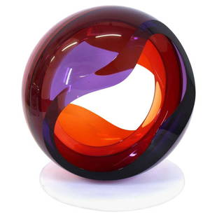 John Kiley Studio Art Glass Sculpture: John Kiley (b. 1973) American studio art glass sculpture of a bi-colored glass orb with open sides, mounted on a rotating platform, 16" H x 14.5" Diameter.