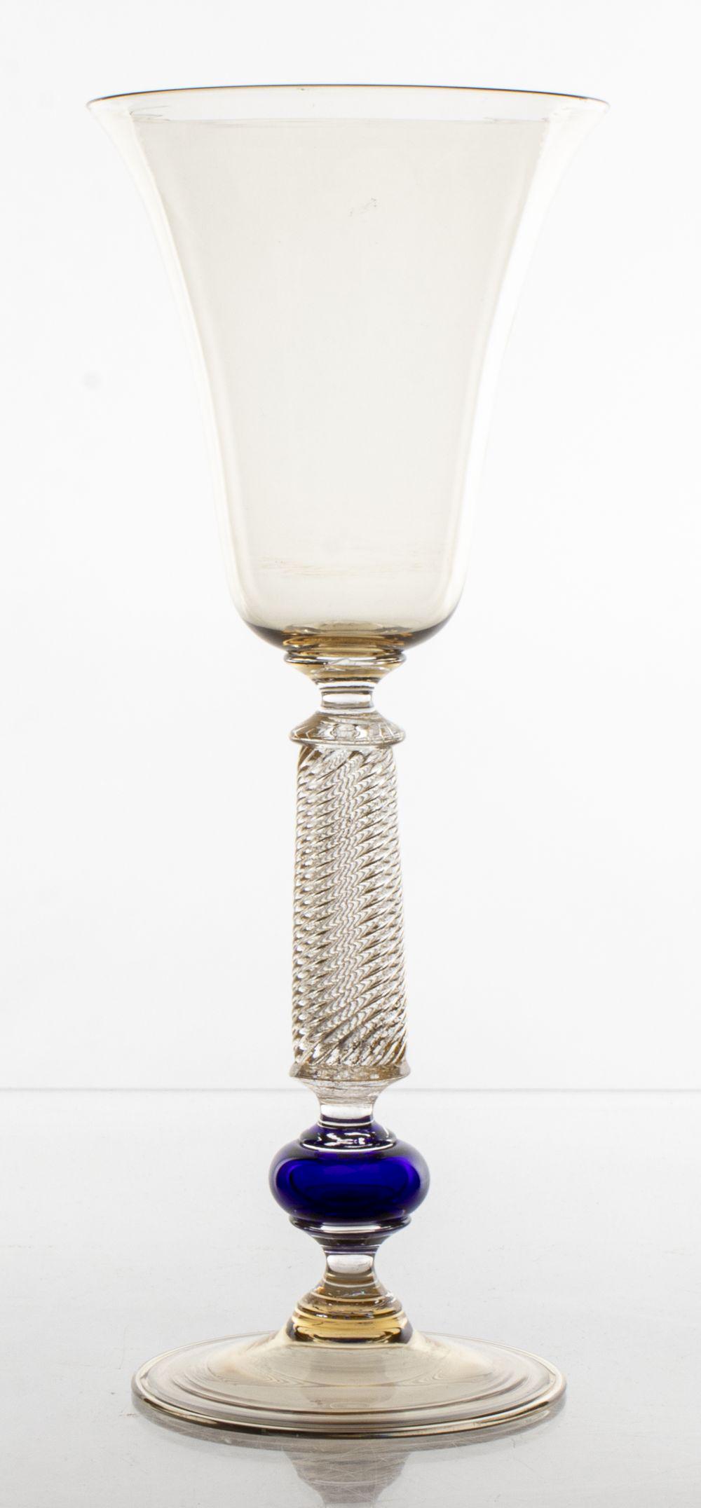 Davide Fuin Venetian Murano Glass Goblet: Davide Fuin Venetian Murano blown brown and blue glass water or wine goblet with twist motif and Avventurina 'pasta stellaria' gold-tone flecked details, signed "Davide Fuin Murano" to base. 9.5” H 