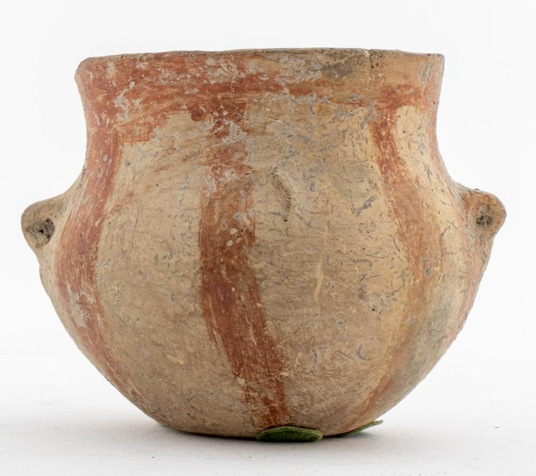 Ancient Neolithic Clay Jar: Neolithic clay jar, Hacilar type, southwest Anatolia, ca, 5800-5300 B.C.E. With flat base and rounded body with vertical rim and twin jug handles, the exterior painted in red over a buff slip with che