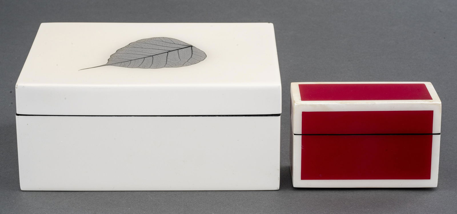 Lacquered Decorative Boxes, 2: Two lacquered decorative boxes, wood and resin. 3.5" H x 8" W x 6" D.