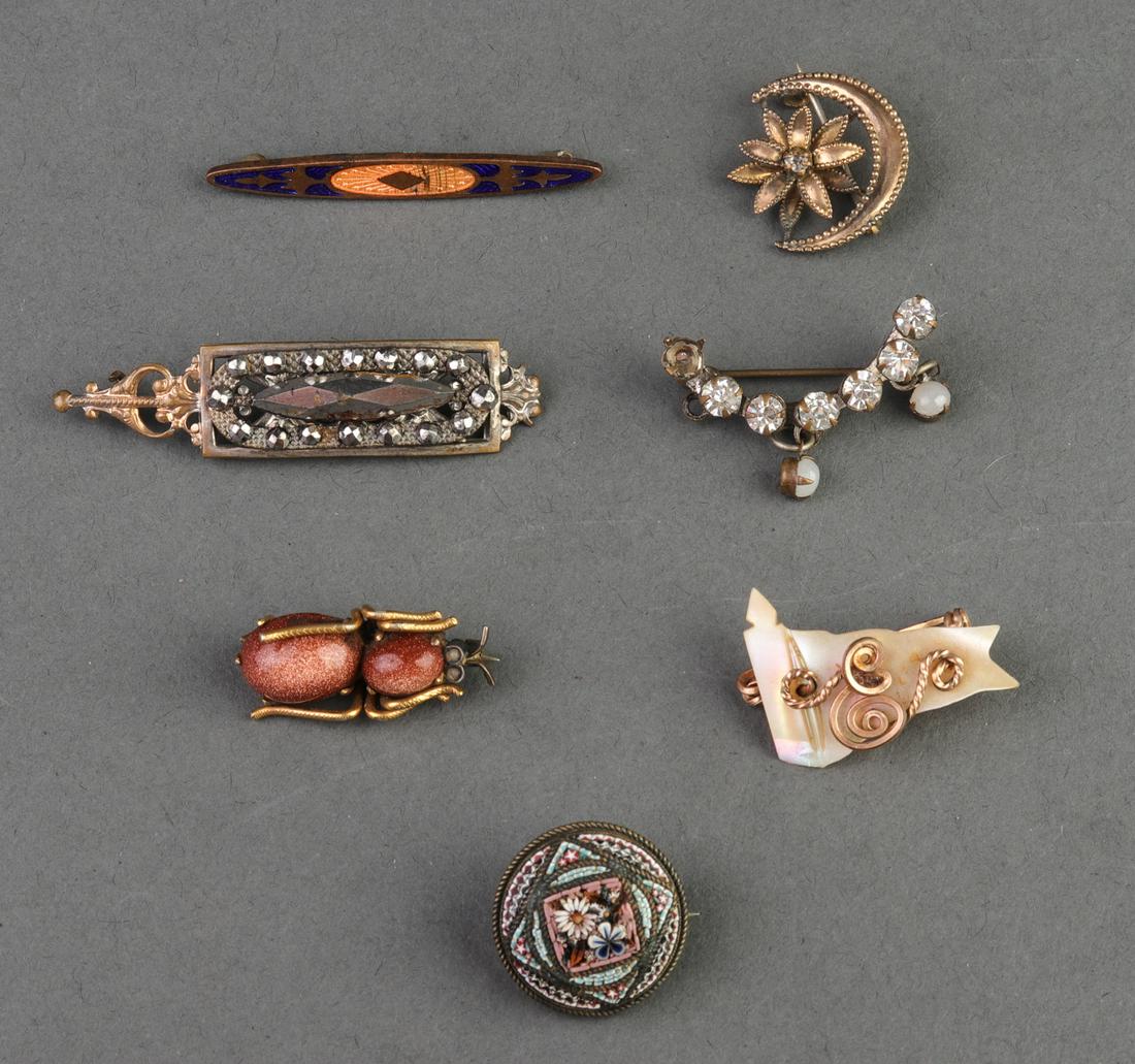 Victorian Manner Marcasite, Micro Mosaic Jewelry,7: Assortment of Victorian manner jewelry, including a marcasite pendant, a rhinestone pin, an enameled pin, a carved mother-of-pearl pin, a micro mosaic brooch, a flower and moon motif brooch, and a gol