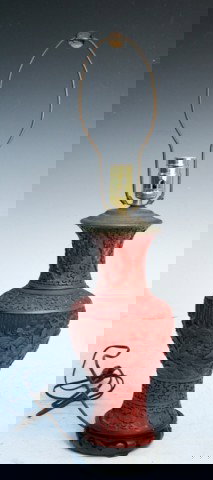 19th C. Chinese Carved Cinnabar Lamp: Carved cinnabar vase mounted as lamp, with landscape and figure scene around the body, and banded floral motif around the neck and foot, China, nineteenth century; unmarked. Dimensions: Approximately