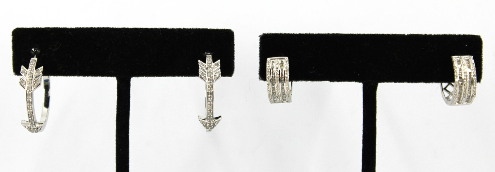 Silver & Diamond Hoop Earrings Lot, 2: Two pairs of sterling silver and diamond hinged huggie and arrow motif hoop earrings, marked: "925 / KPJ" with maker's marks. Huggie style earrings: 0.687" L x 0.25" W, with approx: 146 diamonds; 0.50