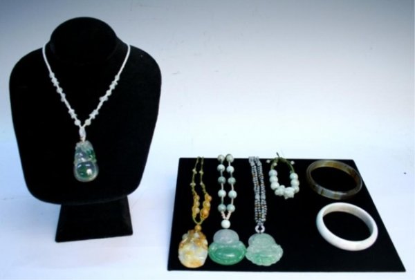 Various Chinese Jade Jewelry Necklaces & Bracelets: Lot includes two jade bangles, one beaded adjustable jade bracelet, and four adjustable jade pendant necklaces featuring Buddha, China; unmarked. Dimensions: White jade bangle 1/4" thick, 2-7/8" diame