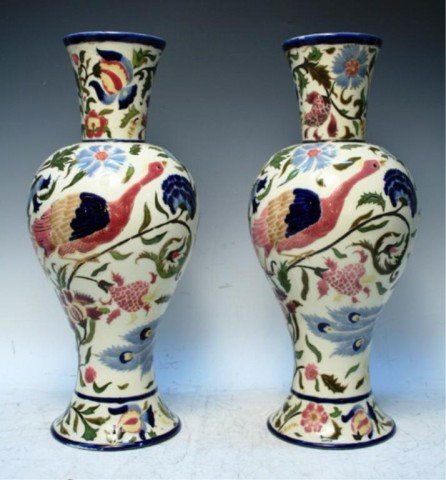 Hungarian Porcelain Zsolnay Vase Pair ca. 1920: Pair of Zsolnay vases decorated with peacocks, flowers and foliage, porcelain, Hungary, circa 1920; marked on bottom. Dimensions: 17-1/4"L x 8"W