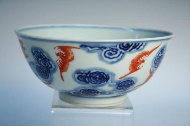 Chinese Blue and White Porcelain Bowl Bats: Blue and white porcelain bowl adorned with red bats, China; marked. Dimensions:2-5/8"H x 6" diameter