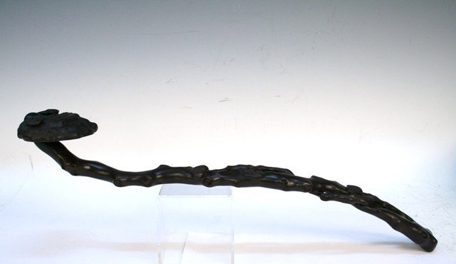 Chinese Carved Zitan Wood Ruyi Scepter: Carved Ruyi wood scepter, carved in naturalistic manner, probably Zitan wood, China; unmarked. Dimensions: 17-1/2"L; widest point 3"