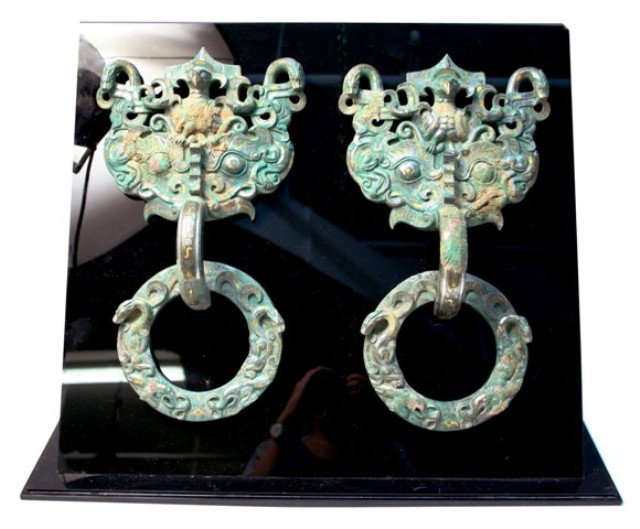 Pair Chinese Tang Dynasty Door Knockers: Pair of door knockers with animal motif, bronze, China, Tang Dynasty (618-907); unmarked. Rings and heads are separate pieces. Custom-made black plexiglass display stand included. Dimensions: Each app