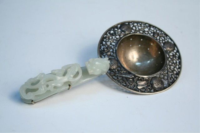 Chinese Silver & White Jade Tea Strainer: Carved buckle mounted to the handle of tea strainer, white jade and silver, China; stamped on back of handle. Dimensions: 6-1/2"L x 3-1/4" diameter