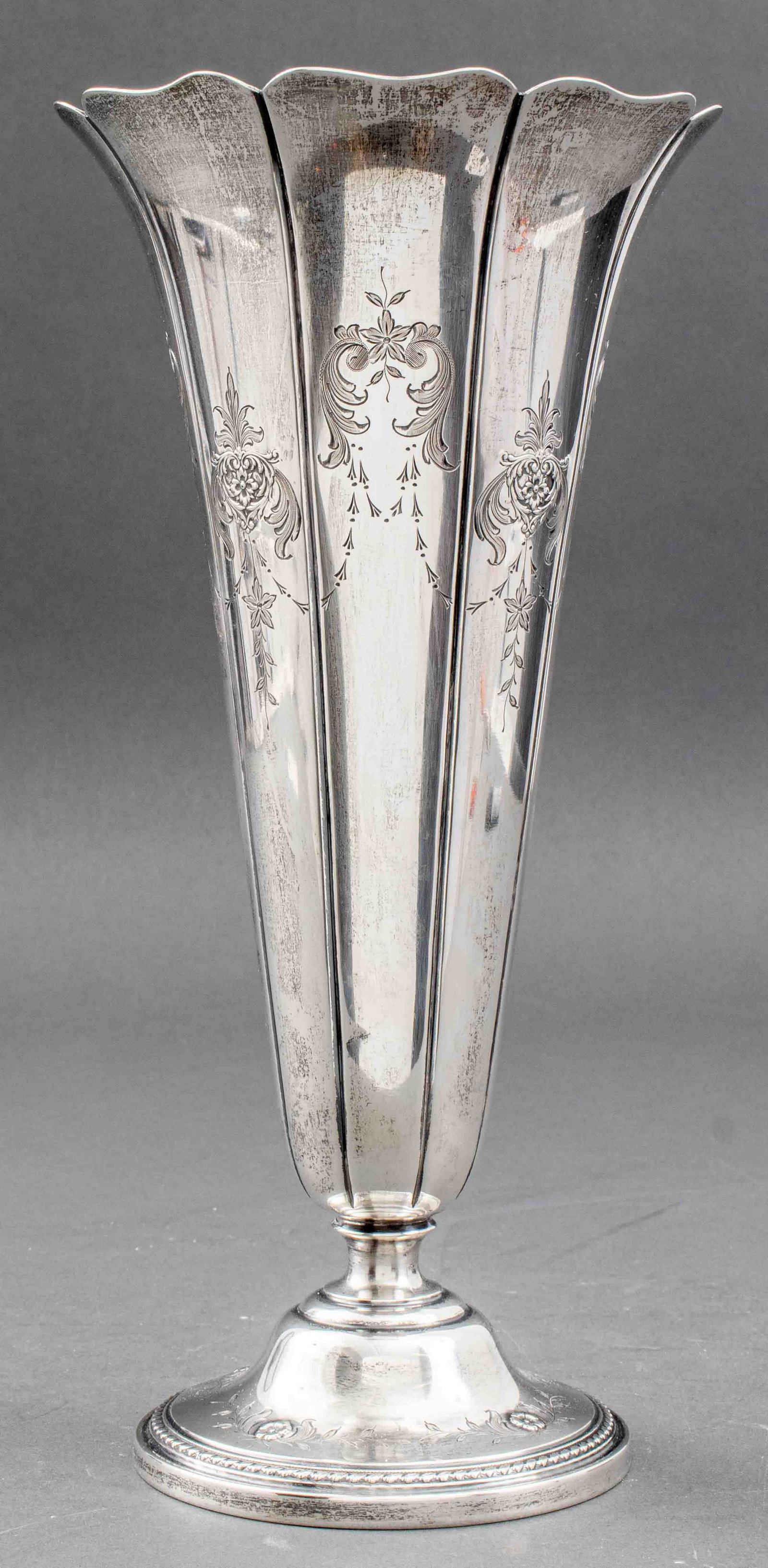 Watson Sterling Large Trumpet Vase: A Watson Company large weighted sterling trumpet vase with engraved floral and foliate decoration. Monogrammed. Marked on the bottom. 12" H x 6" W.