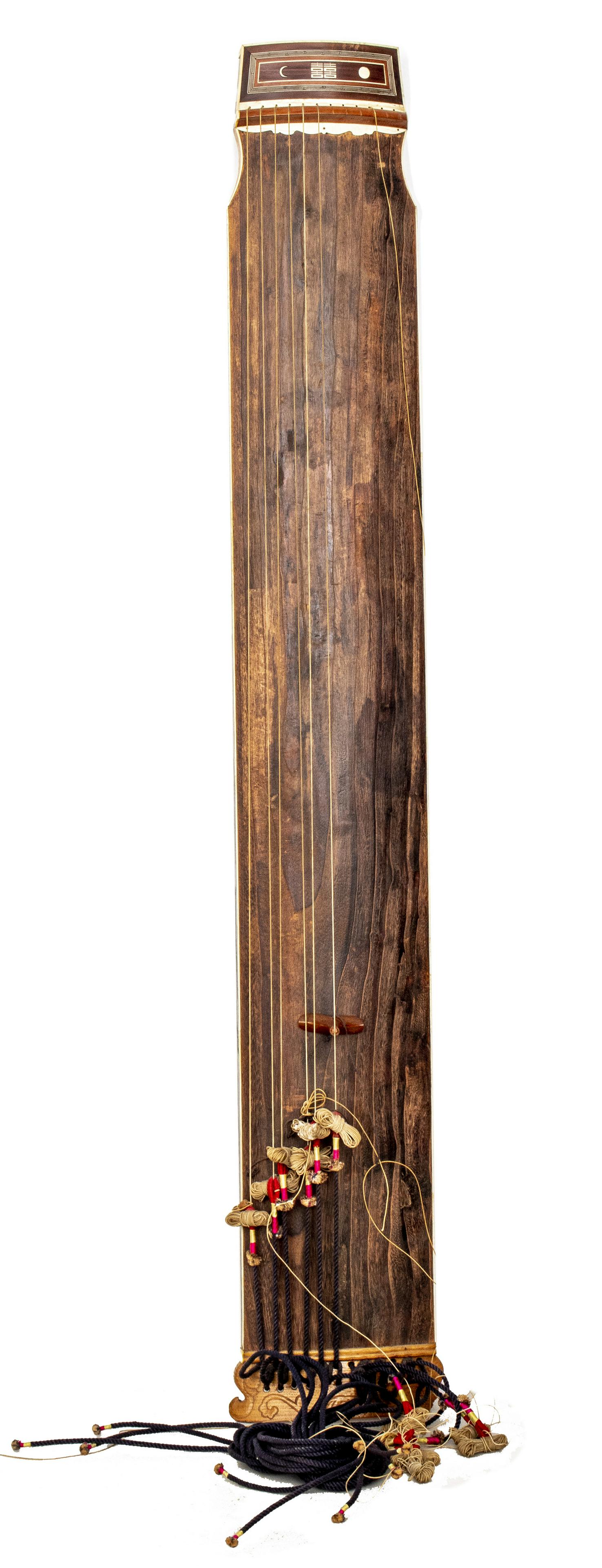 Korean Gayageum Zither Instrument: 12-stringed instrument with bone accents and inlay, sun and moon symbols with "Double Happiness" characters. Silk wrapped strings, missing some anjok (movable bridges) and tolgwae (string pegs). 56.5"
