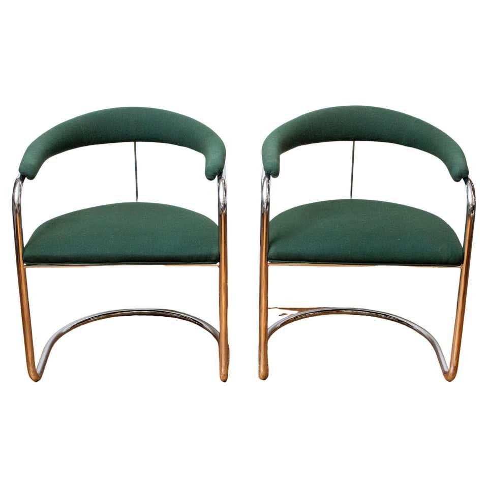 Anton Lorenz Style Modern Chrome Dining Chairs, Pr: Mid-century modern chrome dining chairs with green upholstery, in the style of Anton Lorenz. 23" W x 28.5" H x 21.5" D. 17.75" Seat Height.