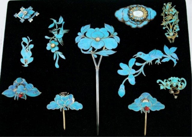Eleven Chinese Kingfisher Feather Hair Ornaments: Collection of eleven kingfisher iridescent turquoise feather hair ornaments, delicately hammered metal in various shapes including birds, bats, butterflies, and flowers, with settings for semi-preciou