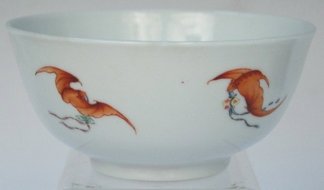 Small Chinese Porcelain Bowl with Bats: Small bowl with bat motif around the body, porcelain, China; marked on bottom. Dimensions: 2-1/8"H x 4-1/2" diameter