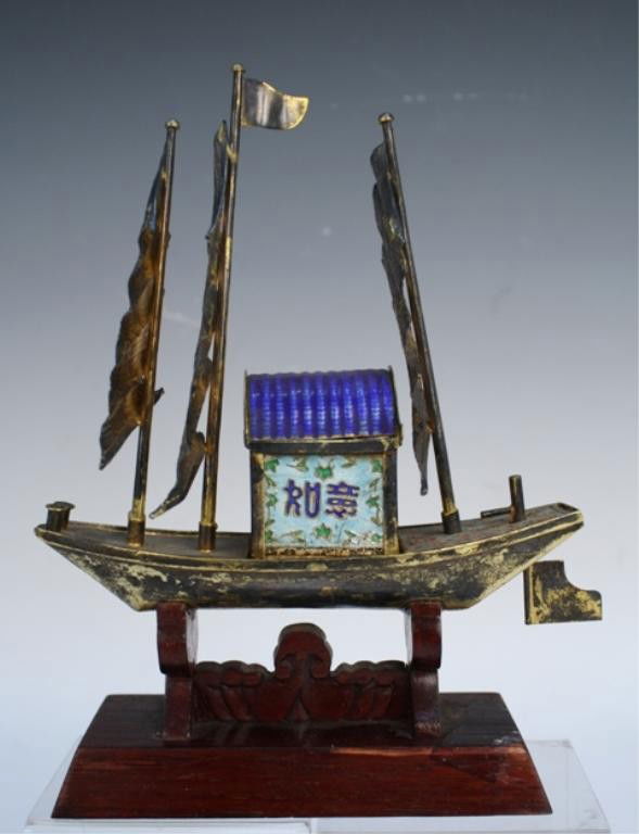 Chinese Export Silver & Enamel Ship 20th Century: Export model of ship with sails, silver and enamel attached to wood stand, China, twentieth century; writing on boat. Dimensions: 8"H x 6"L x 2"D