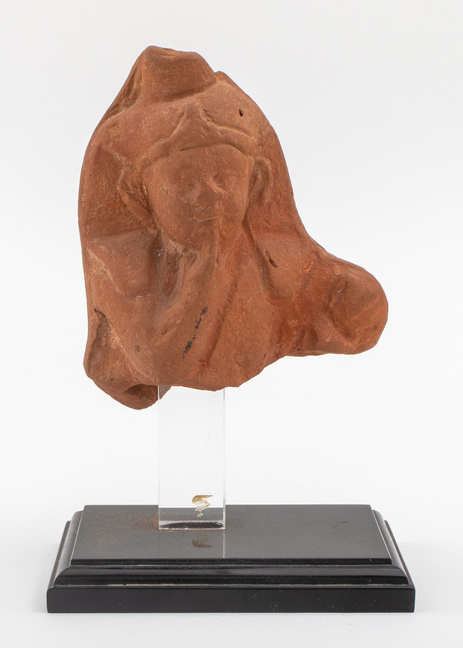 Ancient Alexandrian Terracotta Statue of Horus: Ancient Greco-Roman Alexandrian terracotta statue of the Egyptian god Horus and Greek god Harpocrates, fourth to first centuries B.C.E., together with a fitted lucite stand and Certificate of Authenti