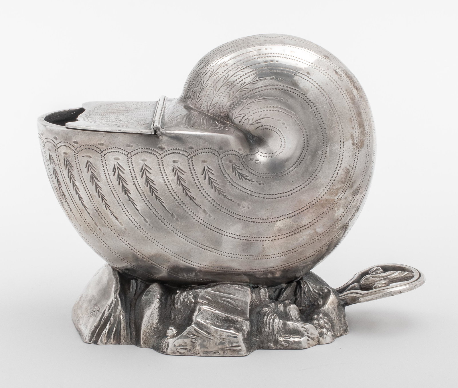 H. Perry & Co. Silver Plate Shell Spoon Warmer: English silverplate engraved nautilus shell spoon warmer set on a rocky base, marked 'H.P. & Co.' to underside likely for H. Perry & co. of Birmingham. 5.5" H x 7.5" W. Provenance: Removed from a coll