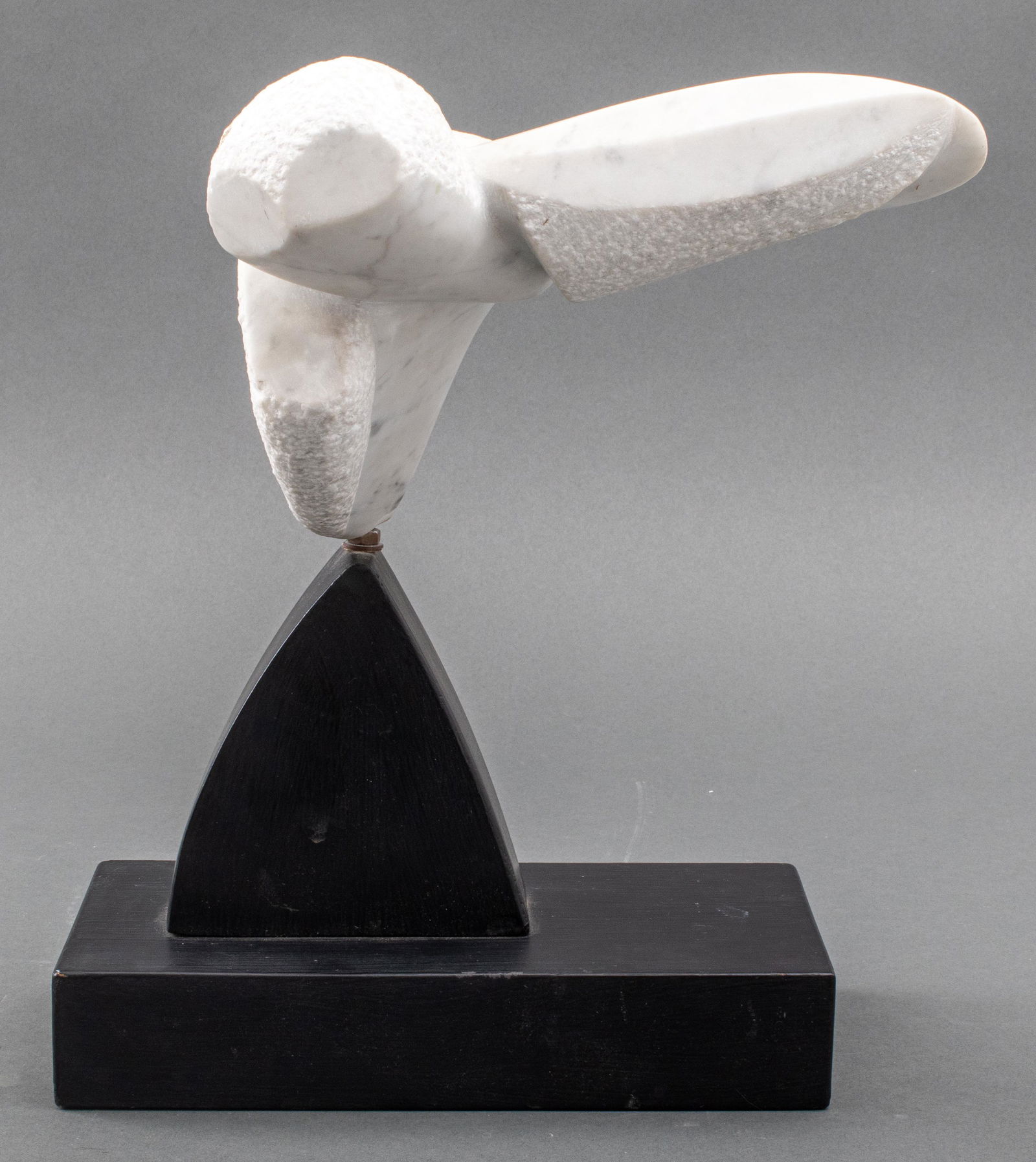 Signed Marble Sculpture of Abstract Turtle, 1998: Modern contemporary white marble sculpture of an abstracted turtle tortoise with an oversized fin, signed "R.E." and dated "98", mounted upon an ebonized wooden base. 13.75" H x 14.5" W x 8.5" W.