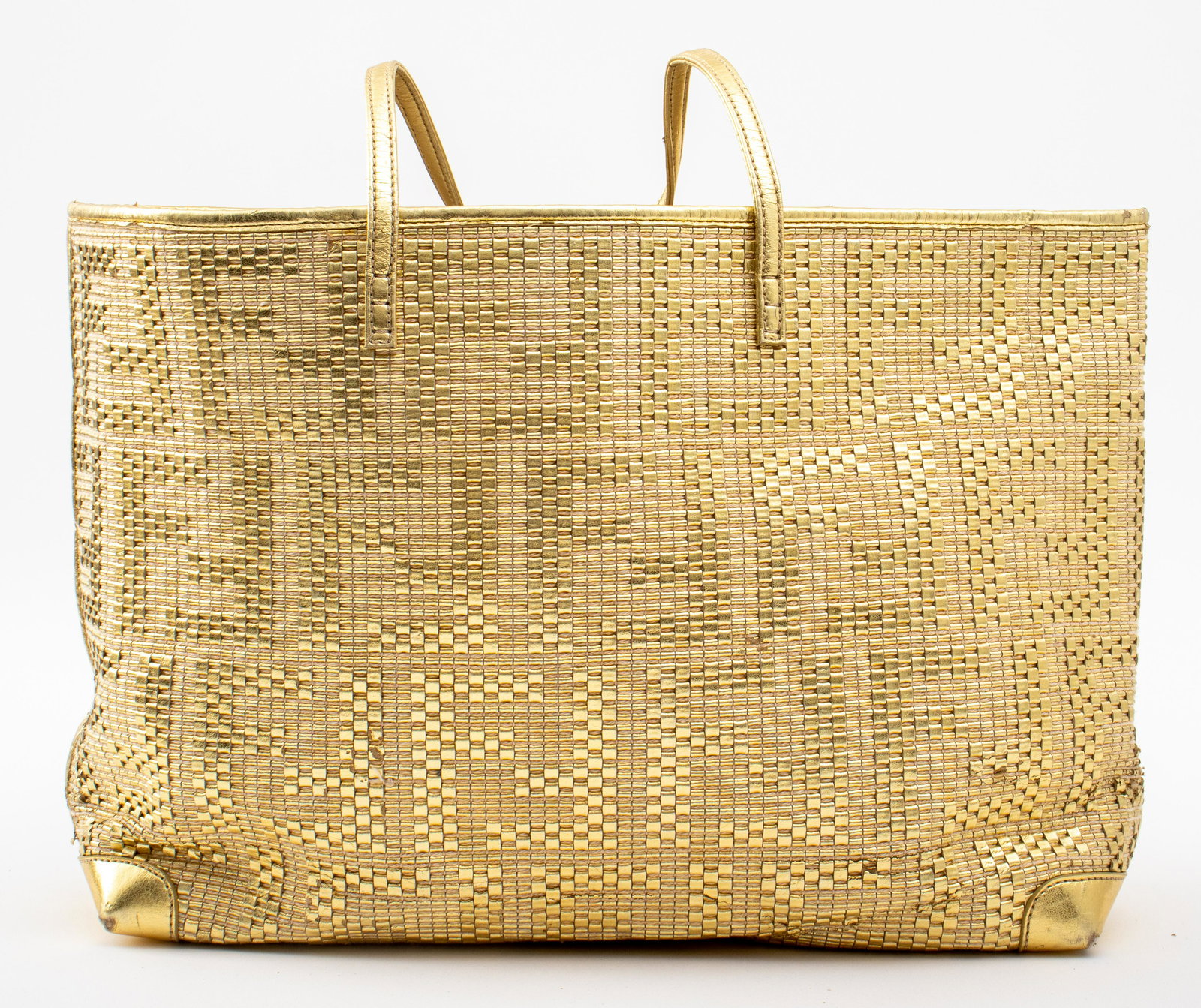 Fendi Gold-Toned Matrioska Woven Leather Tote Bag: Fendi gold-toned matrioska woven leather and canvas handbag or tote bag, with canvas lining, made in Italy, includes tag with serial number. 21" H x 18" W x 5" D (includes handle). Condition: Minor st