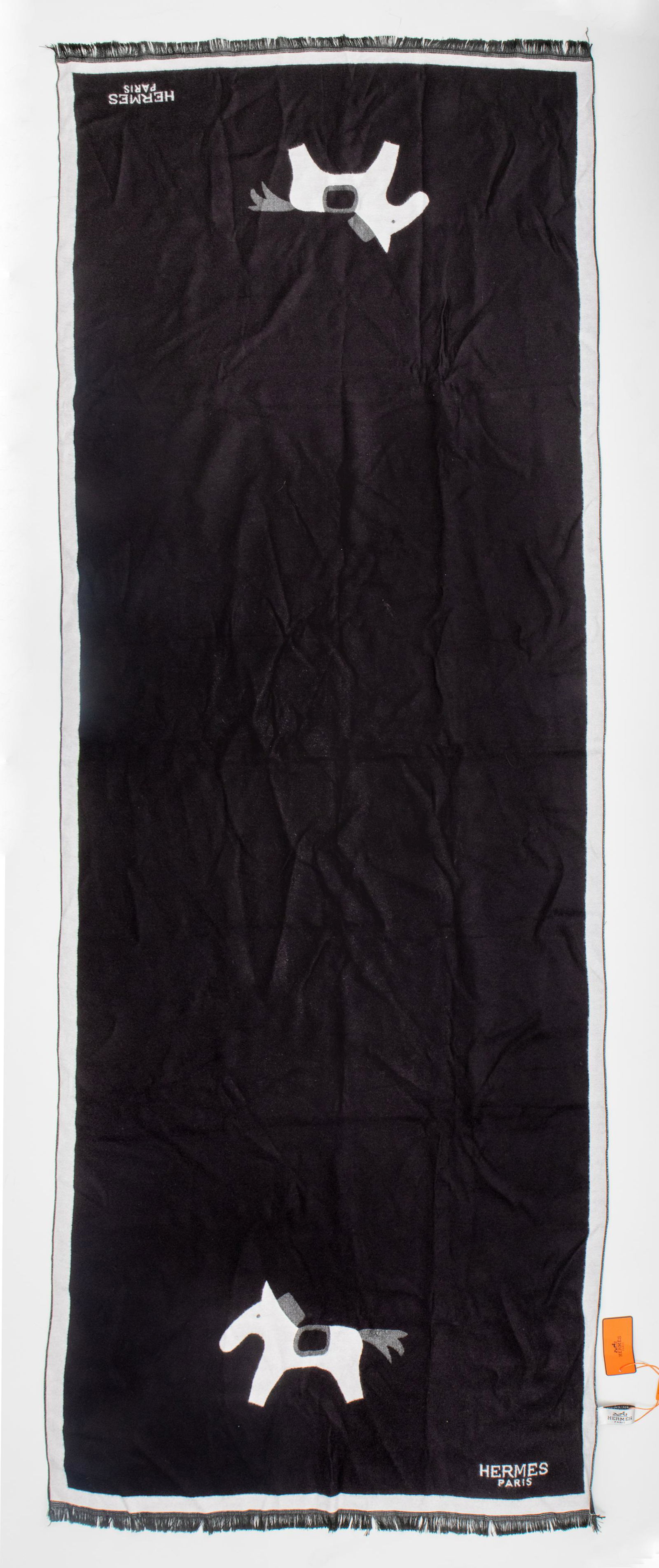 Hermes Paris Wool-Cashmere Blend Scarf: Hermes Paris wool-cashmere blend scarf, decorated with two stylized horses, made in Italy, with the original tag still attached. 74" H x 26" W