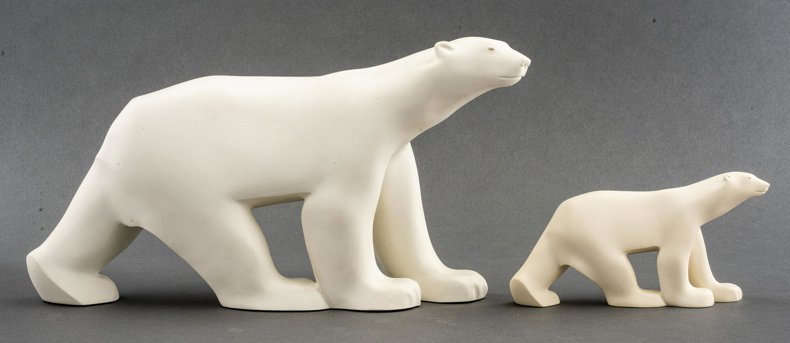 After Francois Pompon Polar Bear Sculptures: After Francois Pompon (French, 1855 - 1933) two modern Polar Bears by the Metropolitan Museum of Art, resin, marked "MMA." 9.25" H x 16" W.