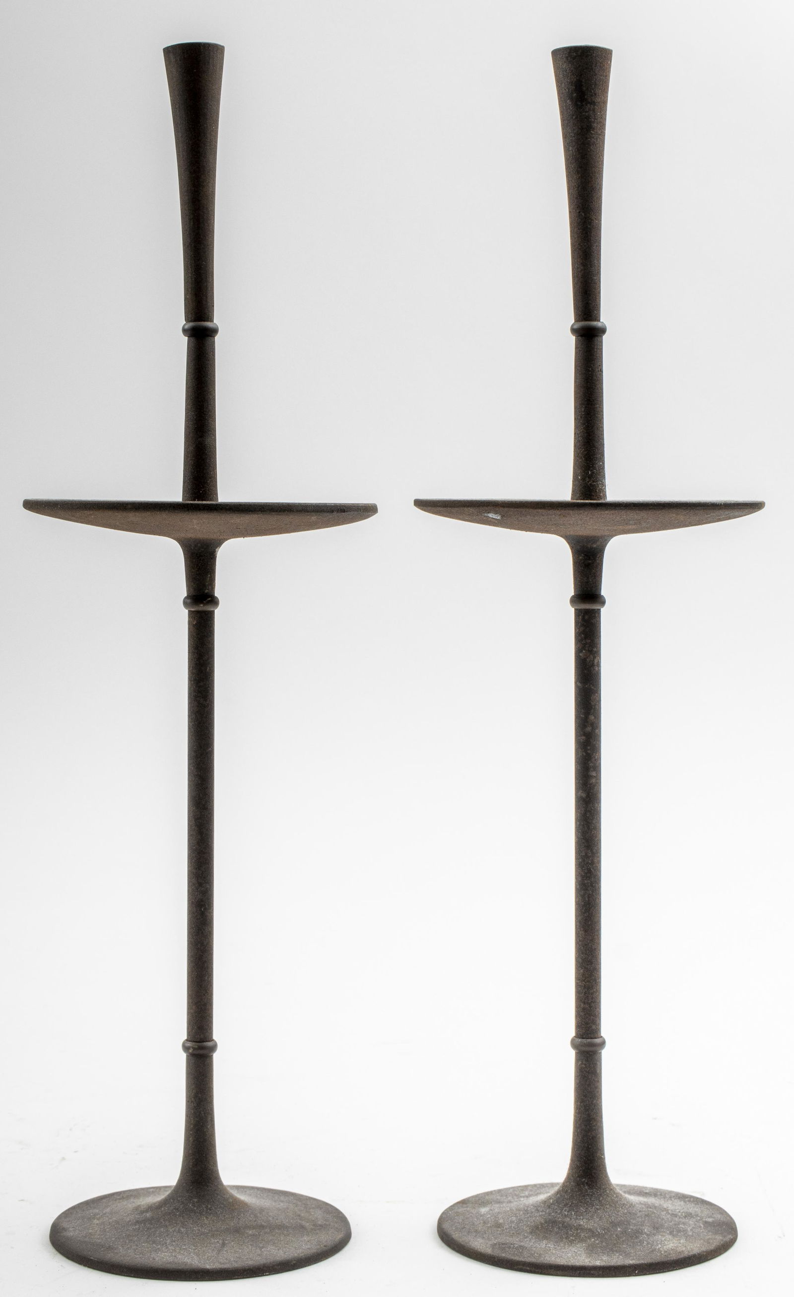 Jens Quistgaard for Dansk Candlesticks, Pair: Pair of Jens Quistgaard for Dansk Designs candlesticks, made in Denmark, marked. 14" H x 3.5" diameter