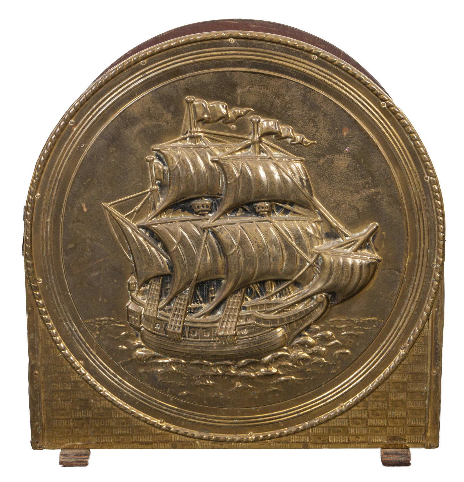 Nautical Maritime Brass Magazine Rack: Nautical Maritime Brass Magazine Rack, with a three-masted ship in full sail within a rondel to each side, on stepped feet. 17" H x 16.25" W x 7.25" D.