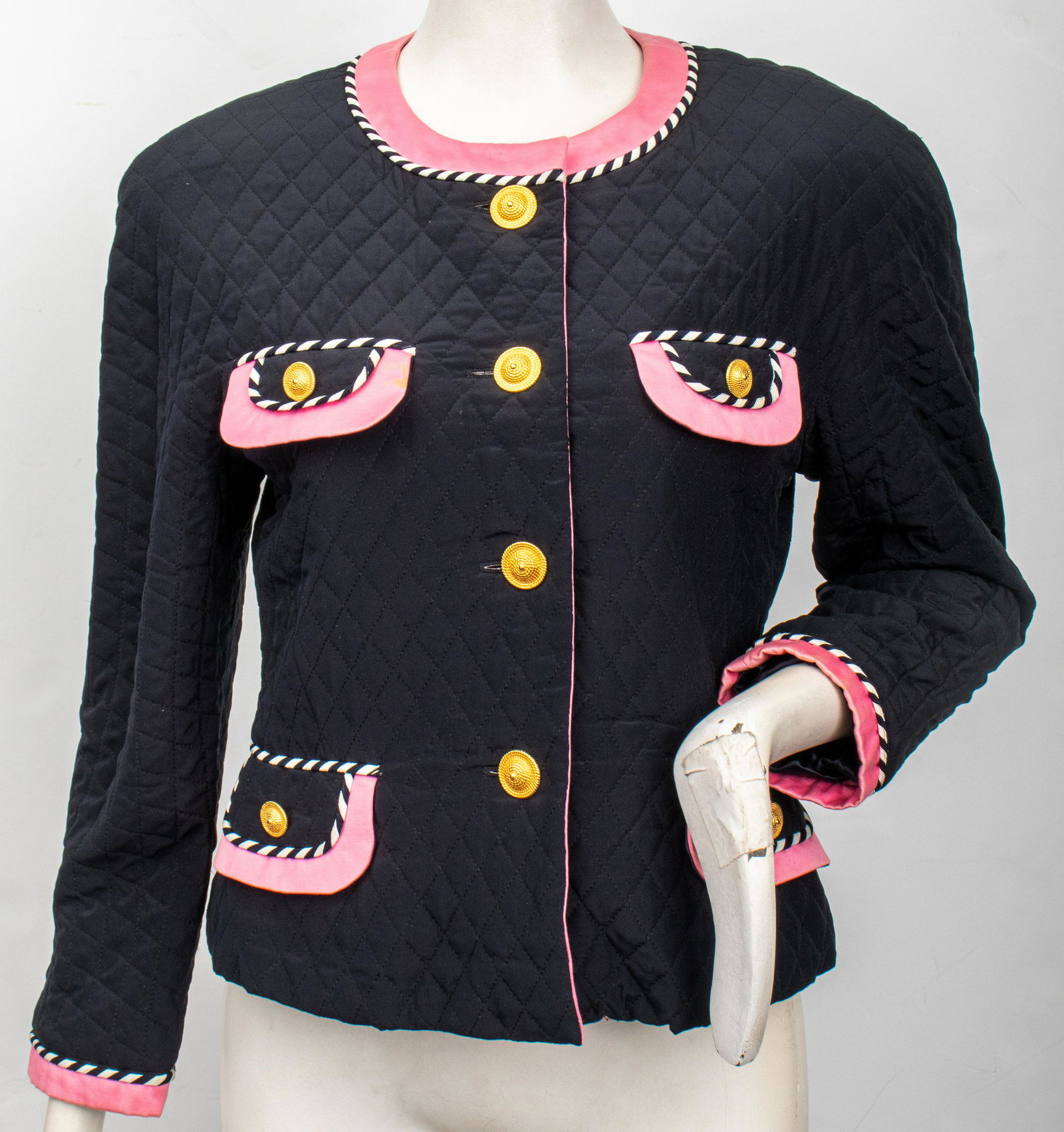 Escada Quilted Pink & Navy Jacket: Escada by Margaretha Ley quilted pink and navy jacket, with striped trim, made in West Germany, no size or composition label present. Runs small. Condition: Some stains. Shoulder: 19", bust: 38", wais