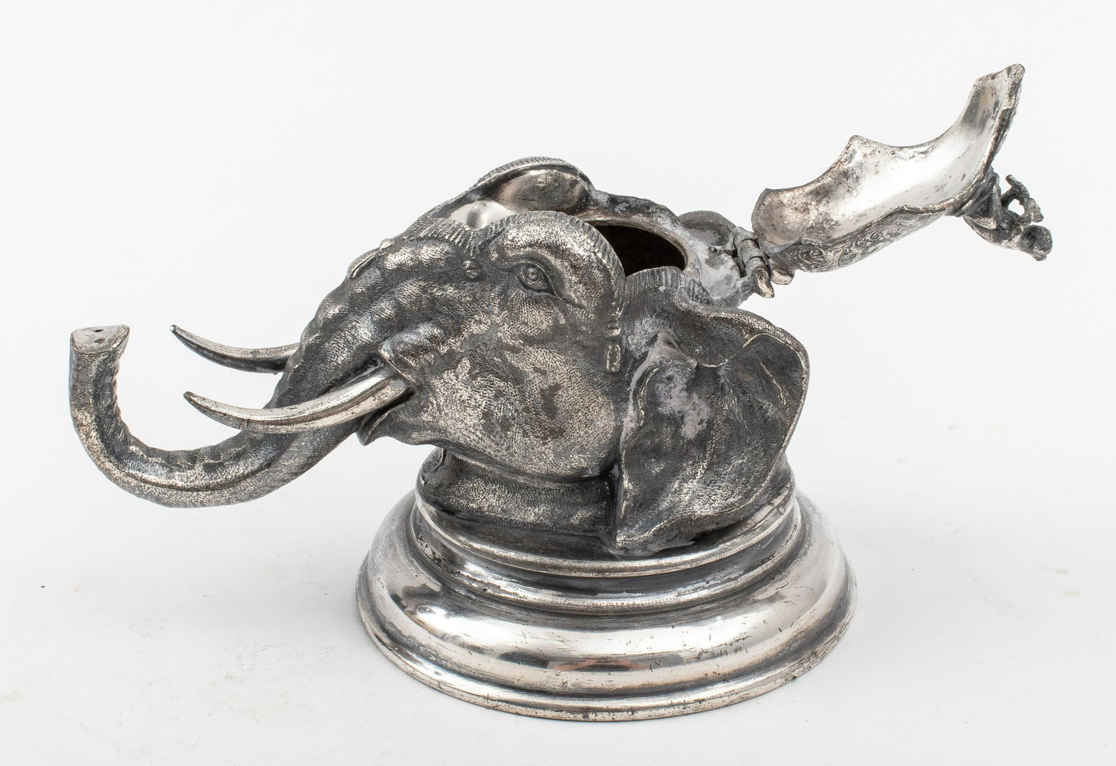 Mappin & Webb Silverplate Elephant-Form Inkwell: British Silverplate Elephant-Form Inkwell, Mappin & Webb, Sheffield or London, marked "Mappin & Webb / Electro / Brittania Metal / Plate / Sheffield & London / 13259" in the form of an Indian elephant