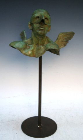 Mexican Bronze Sculpture Bust by Jorge Marin: Sculpture bust of a man wearing a full beak-like mask and wings that rotates on a pole, by Jorge Marin (Mexican, 1963- ), bronze; marked on back. Dimensions: Approximately 20"H x 10"W x 11"D