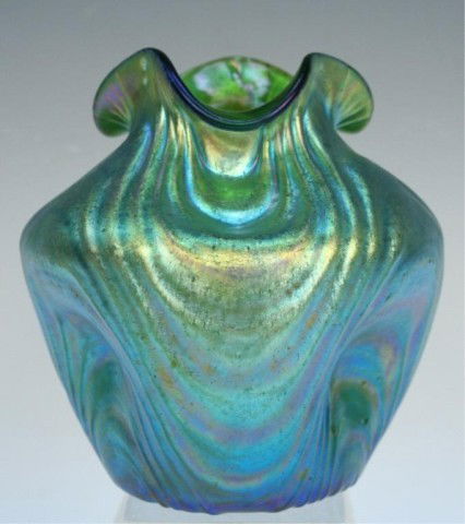 Austrian Loetz Green Iridescent Art Glass Vase: Loetz iridescent green art glass vase with dimpled body and undulating rim , Austria; unmarked. Dimensions: 5-1/2"H x 5" diameter