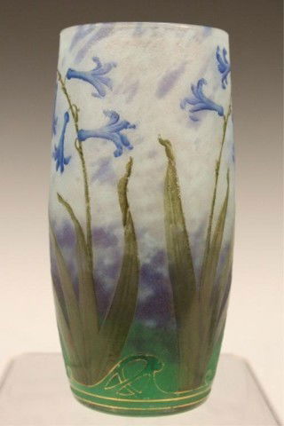 French Daum Nancy Etched & Enameled Glass Vase: Art Nouveau etched and enameled green vase decorated with enameled flowers by Daum Nancy, cameo glass and gold leaf, French, ca. late nineteenth-early twentieth century; signed on bottom. Dimensions:
