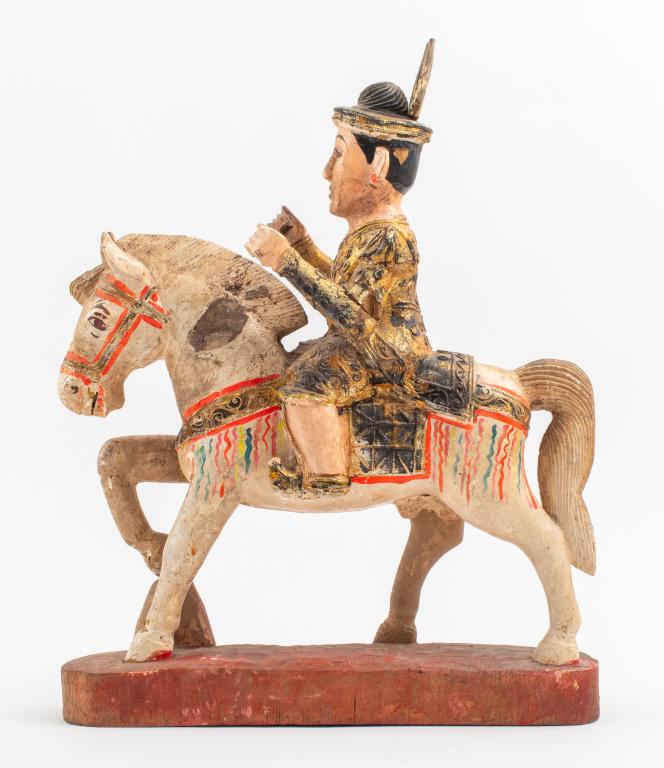 Burmese Painted & Gilt Wood Mounted Nat Sculpture: Antique Burmese polychrome painted and gilt wood sculpture of a Nat spirit guardian mounted on a horse. 19.5" H x 15.5" W x 4.5" D.