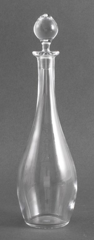 Baccarat Crystal Wine Decanter: Baccarat crystal wine decanter of tear drop form with tapered spherical stopper, marked "Baccarat / France" to underside. 14.25" H x 4" diameter.