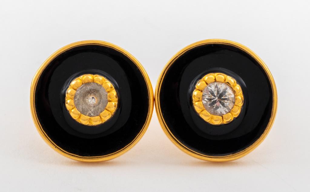 14K Yellow Gold Diamond & Enamel Earrings: A pair of 14K yellow gold earrings, brightly polished and decorated with black resin enamel on the front side, featuring two centered bezel set round brilliant cut diamonds, I-J color and SI clarity, 