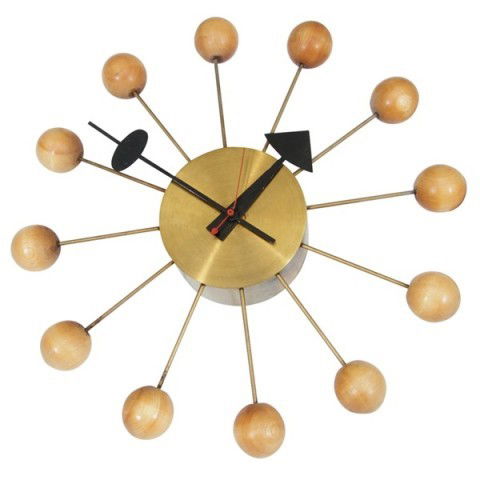 Mid Century "Ball Clock" G. Nelson for H. Miller: The modernist icon "Ball" clock in wood and brass from master mid century designer George Nelson. Produced by Howard Miller, the piece retains its original label. Dimensions: 3"D x 13" diameter