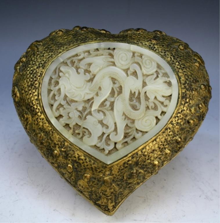 Chinese Copper & Jade Box Qianlong Mark: Copper heart shaped box with carved jade dragon insert on top and figures around, China; Qianlong mark. Dimensions: 4-1/4"H x 7-1/2"W x 6-1/2"D