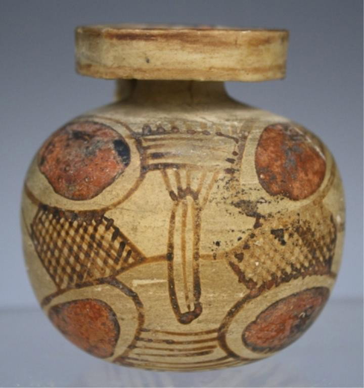 Ancient Greek Corinthian Aryballos 6th Century BC: Small perfume vase with short neck handle and disc rim, the spherical body decorated with lotus buds, Greece, sixth century BC; unmarked. Provenance: NY estate of Norio Azuma, purchased before 1982. D