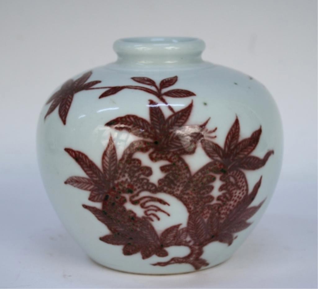 Chinese Copper Red & White Porcelain Water Pot: Copper red and white water pot with floral motif, porcelain, China; Kangxi mark. Dimensions: 3-1/2"H x 4"W