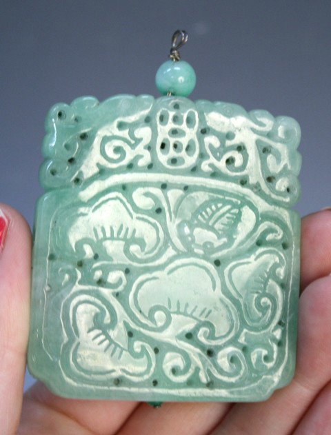 Chinese Jadeite Pendant w Bats & Lingzhi Mushrooms: Green jade pendant with lingzhi mushrooms and a bat on each side, China; unmarked. Dimensions: 2-3/8" H x 2-3/16" W x 3/8" depth