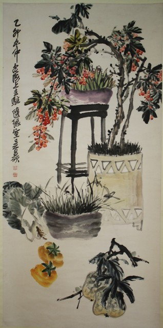 Chinese Floral Scroll Painting attr. Wu Changshuo: Hanging scroll painting of flowers, attributed to Wu Changshuo (Chinese 1844-1927), ink and color on paper; marked. Dimensions: Overall 85-1/2"H x 32"W, Image area 53-1/2"H x 26"W