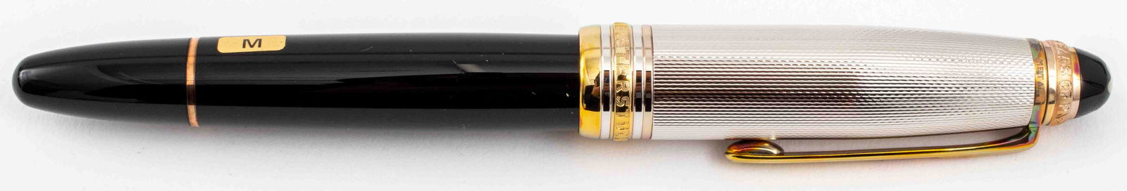 Montblanc Meisterstuck 1924 Edition Fountain Pen: Montblanc Meisterstuck 1924 Limited Anniversary Edition fountain pen,gold-plated sterling silver cap with a diamond above the clip, 18K rose gold nib, nib width "M," inscribed "Montblanc Meisterstuck