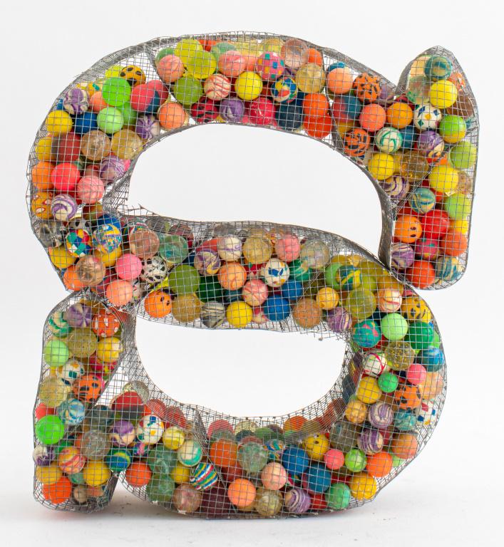 Whimsical "S" Monogram Sculpture: T. Lockwood "Cartesian Letter" whimsical "S" monogram sculpture in the form of a serifed "S" formers of chicken wire and filled with colorful rubber balls. 18.5" H x 15" W x 5" D