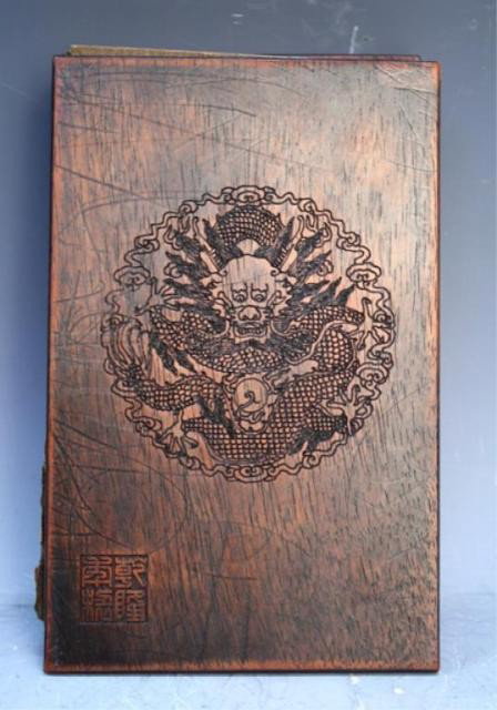 Chinese 8 Spinach Jade Carved Buddhist Panels Qing: Buddhist album of eight rare carved and gilt spinach jade panels mounted with Zitan cover, wood and jade, China, Qing Period; marked. Dimensions: 9" L x 5-3/4" W x 2" Depth