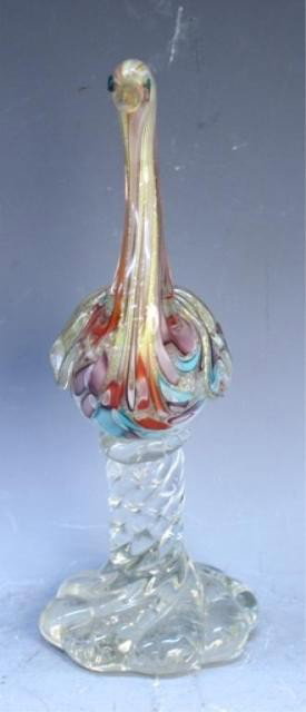 Italian Murano Multicolored Small Glass Swan: Blue, purple, yellow, white, and red sparkly small glass swan, Murano, Italy, 1900s; unmarked. Dimensions: 9" H x 5-1/2" W x 3-1/2" D