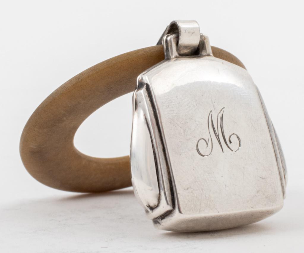 Webster Co. Sterling & Shell Baby Bell Teether: Webster Co. sterling silver baby bell and shell teether (mother of pearl, now well-patinated) the bell struck with the marks of Webster Co. (division of Reed & Barton), ca. 1960s, and with an English 